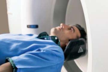 Patient entering a PET scan