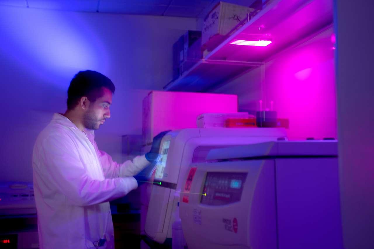 UCLA cancer researcher working in a lab